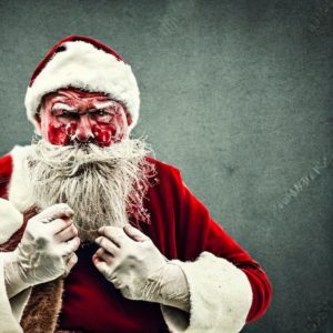 Bloody Santa Claus ready for a fist fight